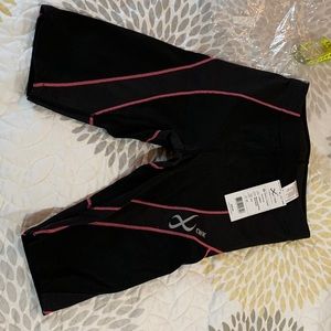 CWX pro shorts back/soft pink size: XS womens brand new
